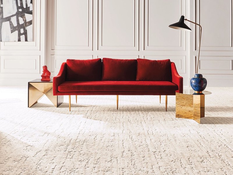 red sofa on beige carpet from Traditional Floors in Milan, IL